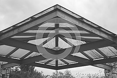 Symmetrical roof structure in black and white. Stock Photo