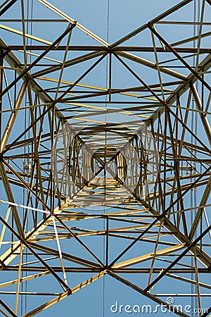 Symmetrical shot of Electricity Pylon from below Stock Photo