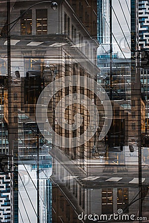 symmetry and mirrored geometry pattern, reflected yellow modern building abstract background, lines and tunnel Stock Photo