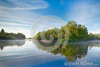 Symmetry reflection on the summer river Stock Photo
