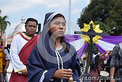 Sympathetic woman felt disgust on Jesus Christ trial walking, street drama, community celebrates Good Friday representing the eve Editorial Stock Photo