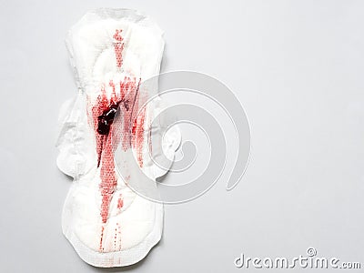 Symptom of endometriosis, menstrual blood with blood clots on a sanitary pad Stock Photo