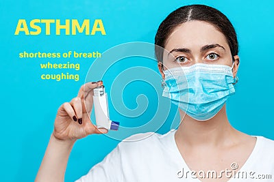 Symptoms of allergy asthma. Portrait of a woman in a medical mask, shows an inhaler. Blue background with text Stock Photo