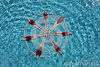 Synchronised Swimmers Forming A Circle Stock Photo