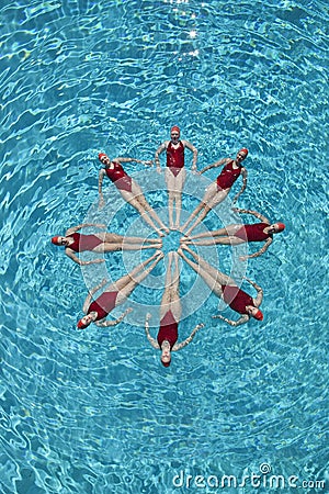 Synchronised Swimmers Forming A Circle Stock Photo