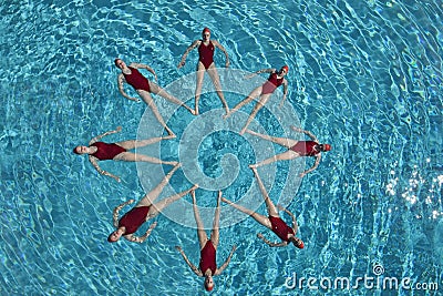 Synchronised Swimmers Forming A Star Shape Stock Photo