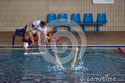 Synchronous swimer legs Editorial Stock Photo