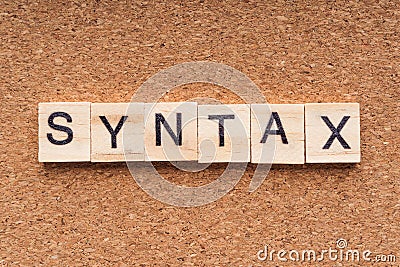 SYNTAX word written on wood block. Stock Photo