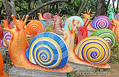 The synthetic giant snails as garden decoration in Nong Nooch tropical garden in Pattaya Stock Photo