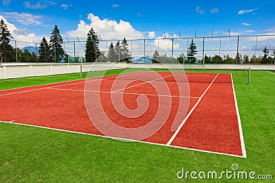 Synthetic outdoor tennis court Stock Photo