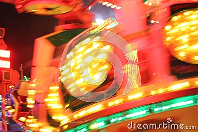 Synthwave disco lights funfair fairground Night colors of the amusement park Stock Photo