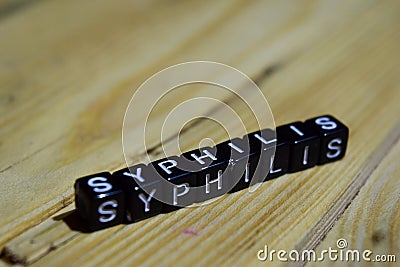 Syphilis written on wooden blocks. Inspiration and motivation concepts. Stock Photo