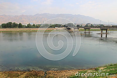 The Syr Darya river in Khujand city, Tajikistan Stock Photo