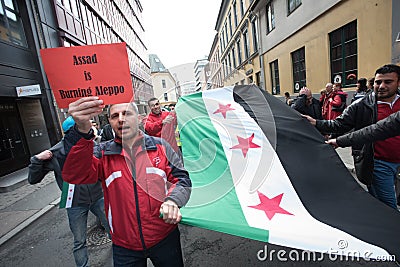 Syria protest flag and signs Editorial Stock Photo