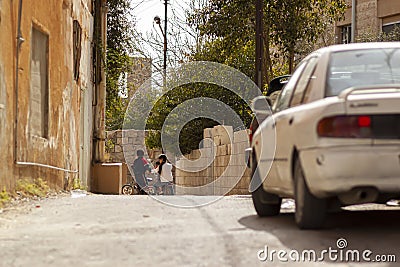 Syrian kids playing in street in a poor neighborhood Editorial Stock Photo