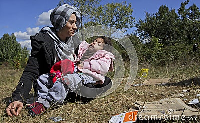 Syrian refugee mother daughter Editorial Stock Photo