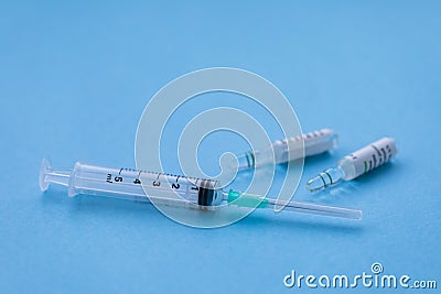 Syringe with ampoules, medical cure concept, with a copy space Stock Photo