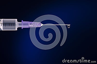 Syringe with cannula and drop Stock Photo