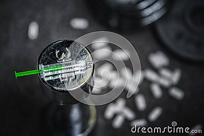 Syringe and drugs in gym, doping in sport concept photo Stock Photo