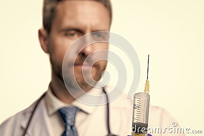 syringe in hands of doctor. syringe for anaesthesia. selective focus of syringe Stock Photo