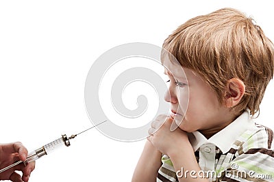 Syringe injecting child Stock Photo