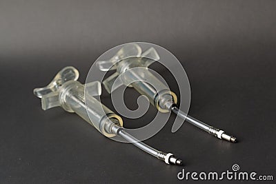 Syringe for pumping the hydraulic brakes. Stock Photo