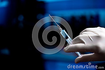 Syringe With Vaccine Before Immunization and Vaccination. Medicine From SARS Coronavirus, 2019-nCoV In Laboratory Stock Photo