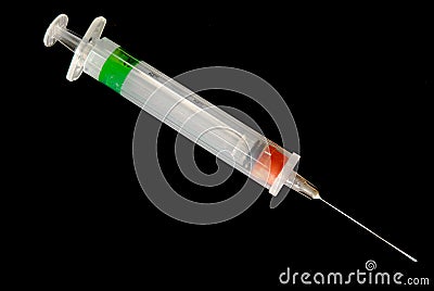 Syringe w top off on black Stock Photo