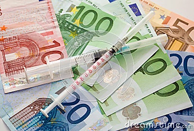 Syringes and Euro money Stock Photo