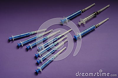 Syringe shape in the shape of a bird`s wedge Stock Photo