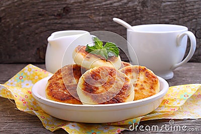 Syrniki (Cottage cheese pancakes, Fritters of cottage cheese) Stock Photo
