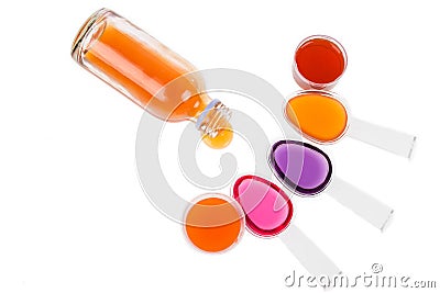 Syrup Medication Bottles and Medicine in Spoons Stock Photo