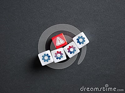 System error alert notification on red dice among settings gears cubes Stock Photo