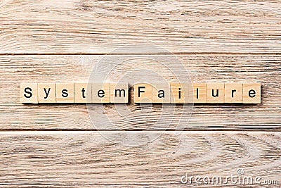 System failure word written on wood block. system failure text on table, concept Stock Photo