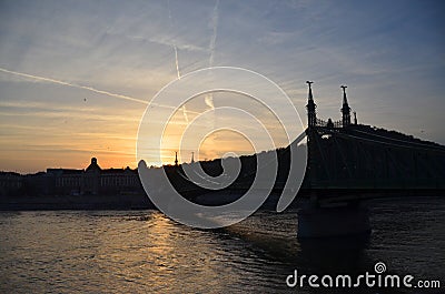 View of the Liberty bridge at Budapest, Hungary during sunset time. Stock Photo