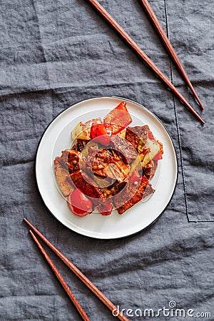 Szechuan traditional dish Hui Guo Rou, spicy roasted pork with leek and bell pepper Stock Photo