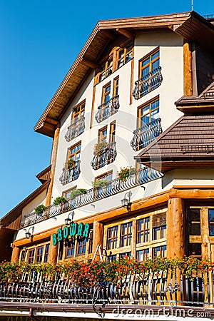 Wooden building of a hotel in open air museum in Szymbark village, Poland Editorial Stock Photo