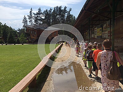 Szymbark, Poland - school children visiting the local open air museum Editorial Stock Photo