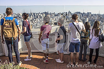 Traveler looking on a big city Editorial Stock Photo