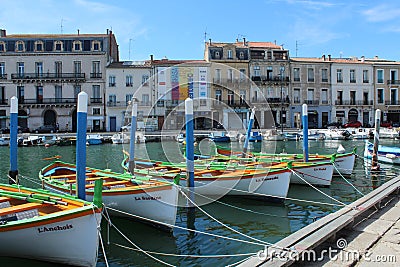 SÃ¨te, France - April 2019: small, wooden, brightly painted row boats moored on Canal de la Peyrade Editorial Stock Photo
