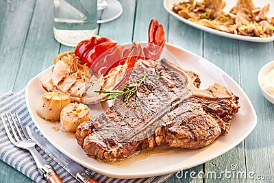 T bone steak and lobster plate Stock Photo