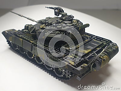 Work hard to complete the metal puzzle T-90 main tank and take a photo Stock Photo