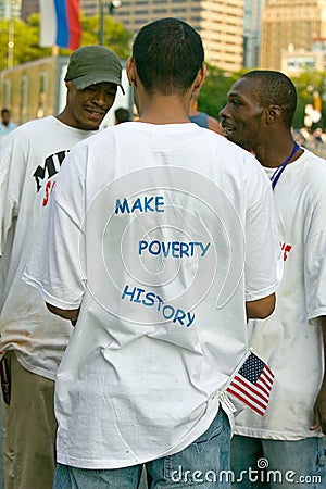 T-shirt reads ï¿½End Poverty in Africaï¿½ from Live 8 Philadelphia Concert to promote African causes Editorial Stock Photo