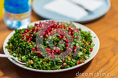 Tabbouleh is a Levantine salad made mostly of finely chopped parsley Tabbouleh Chopped Parsley Tabouli Syrian Salad Stock Photo