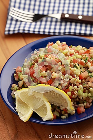 Tabbouleh salad with mung beans and vegetables Stock Photo