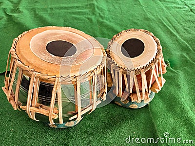 tabla musical instrument keep on green background Stock Photo