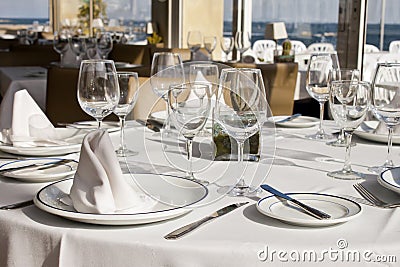 Table crockery setting in a restaurant Stock Photo