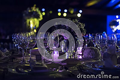 Table decoration, night wedding decoration with candles and wine glasses, wedding centerpiece Stock Photo