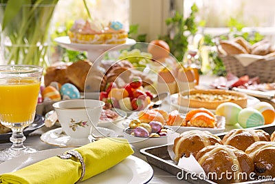 Table with delicatessen ready for Easter brunch Stock Photo