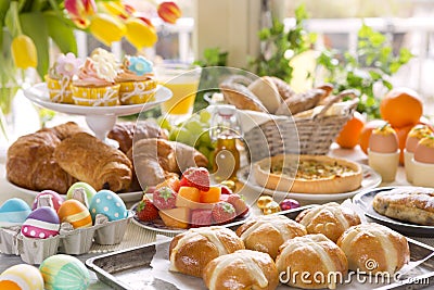 Table with delicatessen ready for Easter brunch Stock Photo